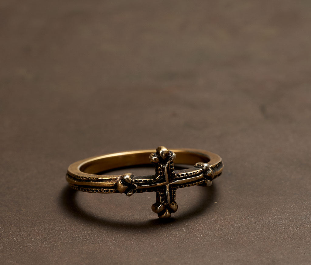 ring symbol cross gold