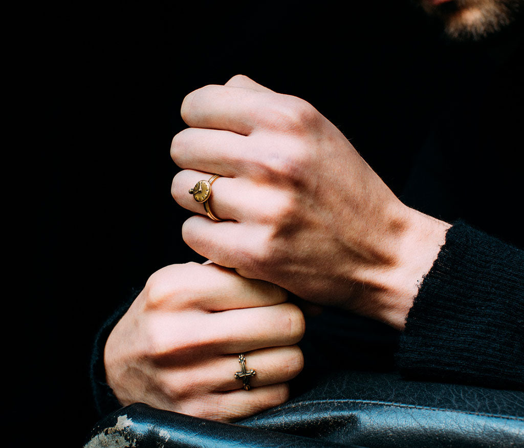 ring symbol cross gold