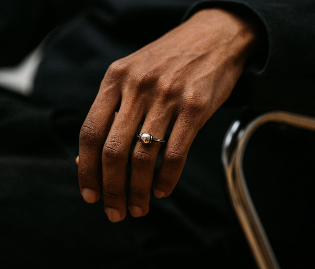ring symbol pearl