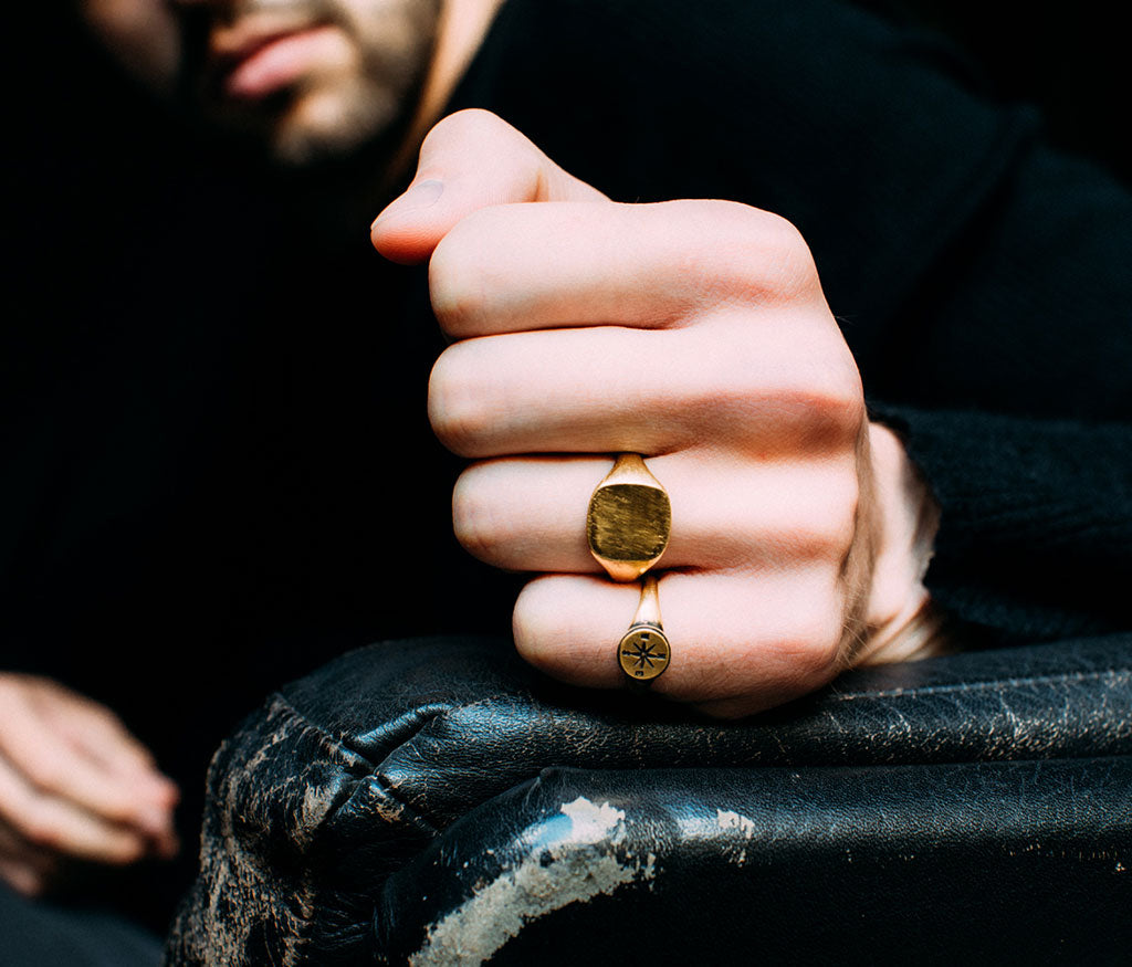 ring symbol windrose gold