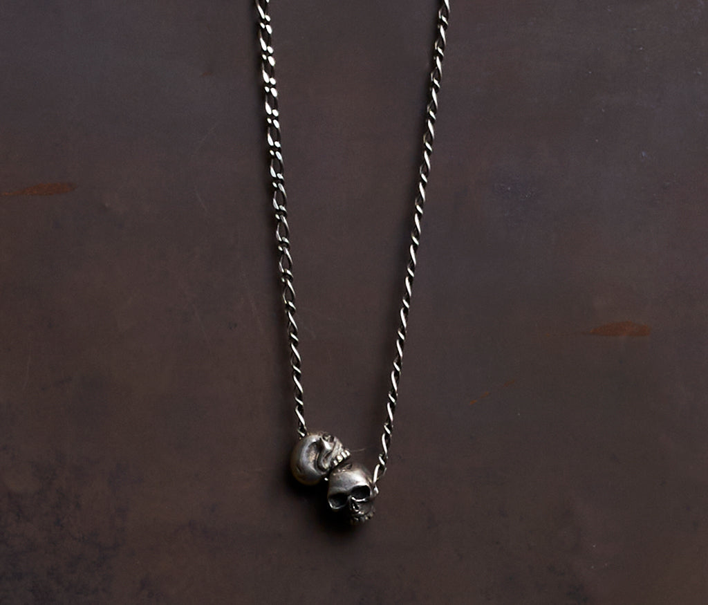 necklace two skulls