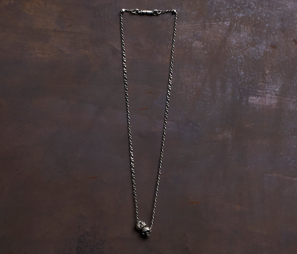 necklace two skulls