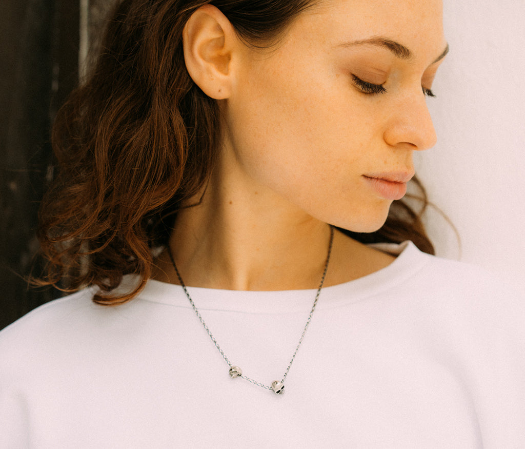 necklace two skulls
