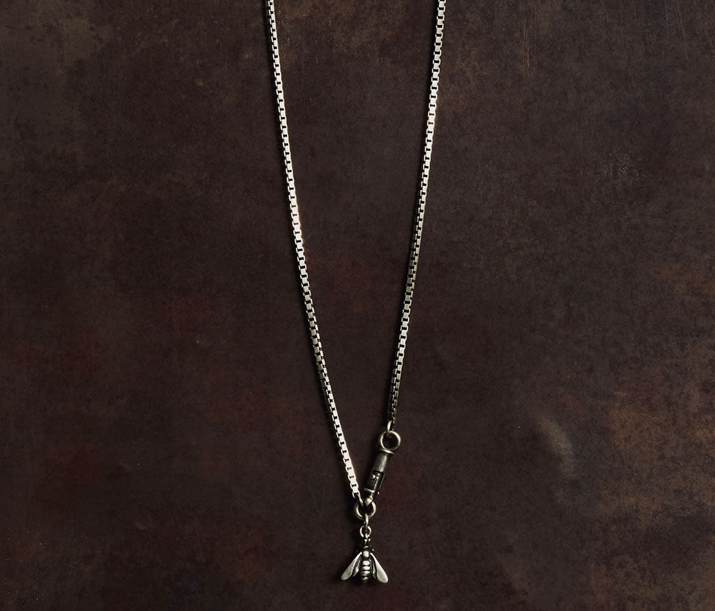 necklace symbol bee