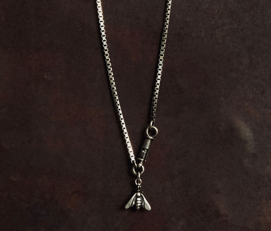 necklace symbol bee