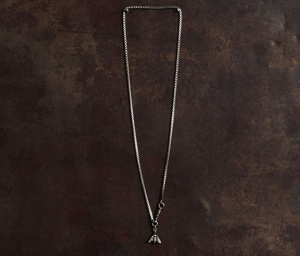 necklace symbol bee