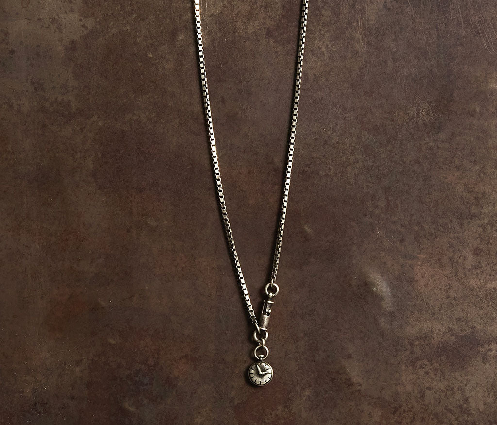 necklace symbol clock