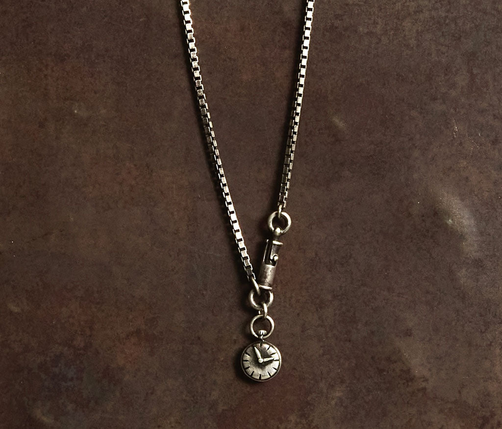 necklace symbol clock