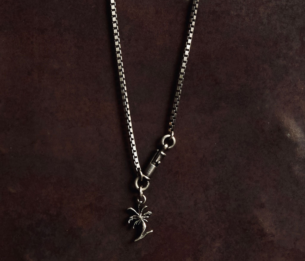 necklace symbol palm