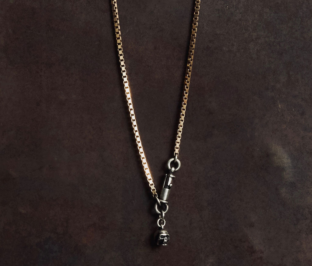 necklace symbol skull silvergold