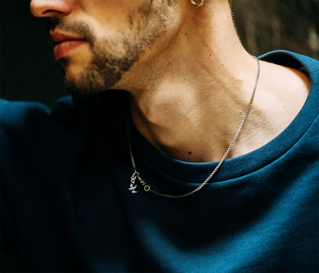 necklace symbol swallow
