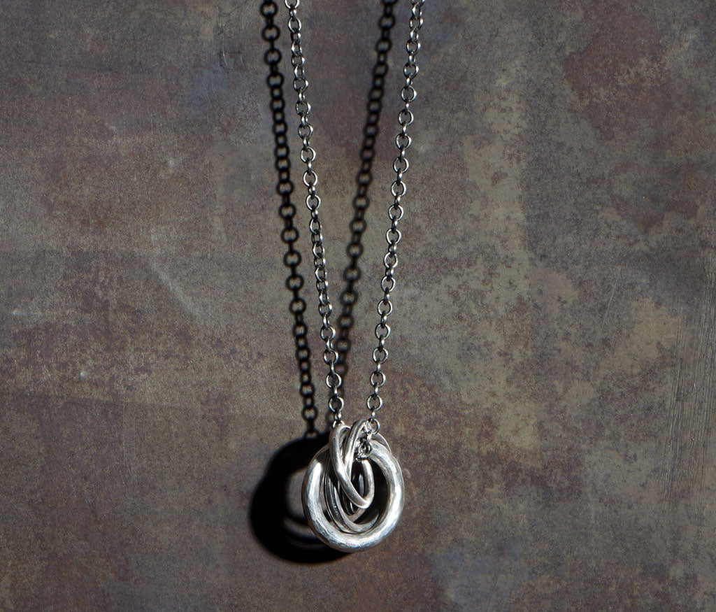 necklace four rings