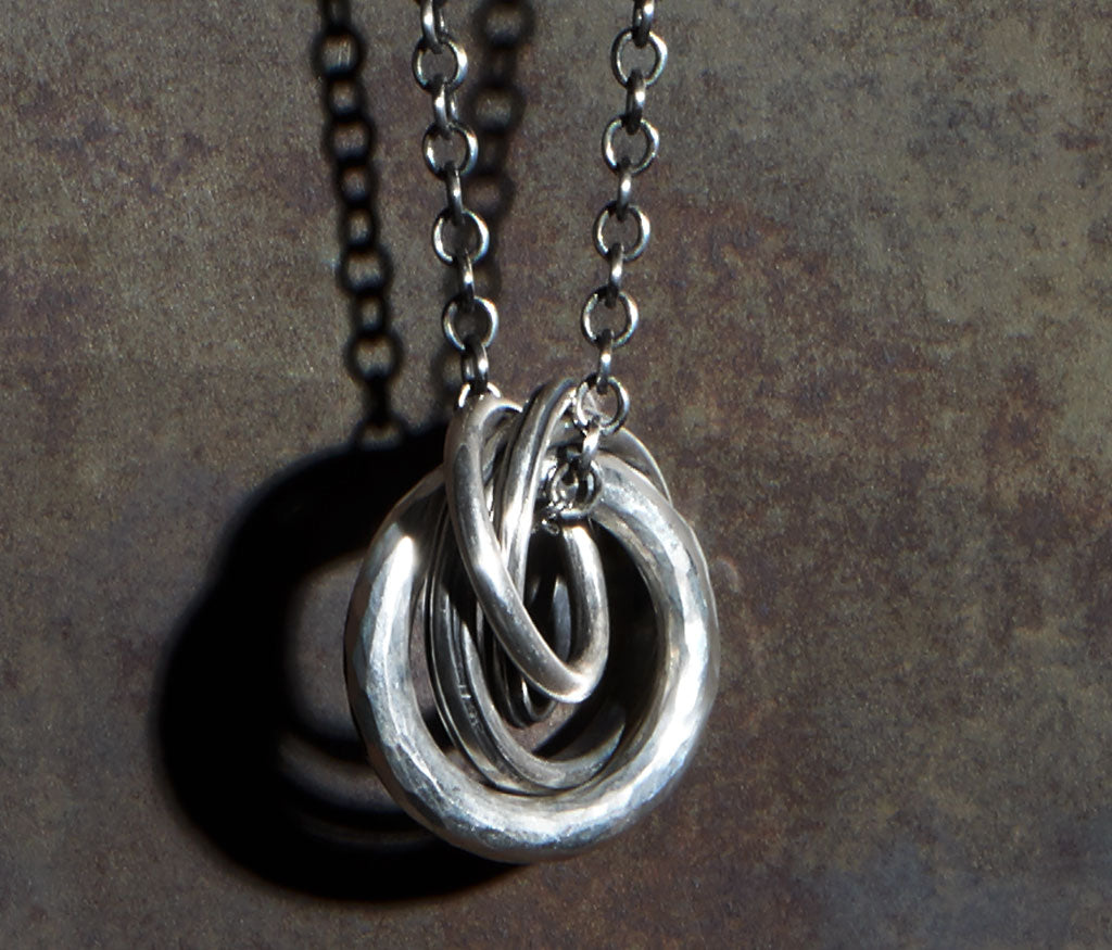 necklace four rings