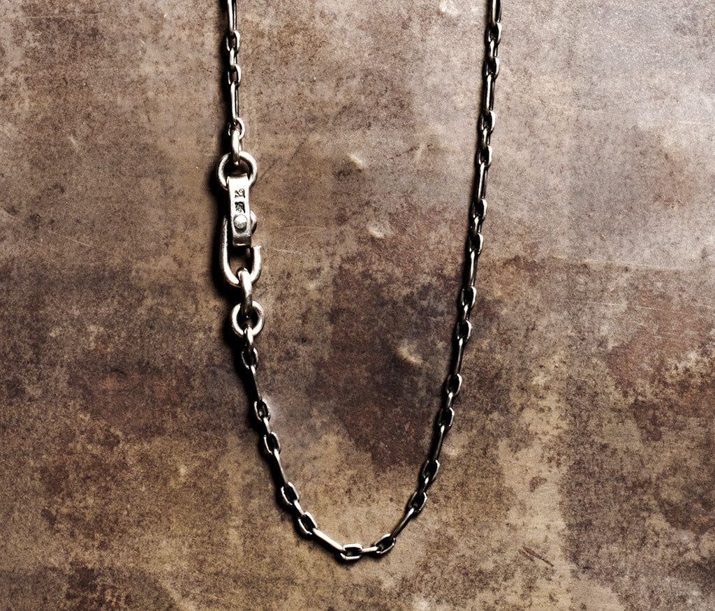 necklace squeezed