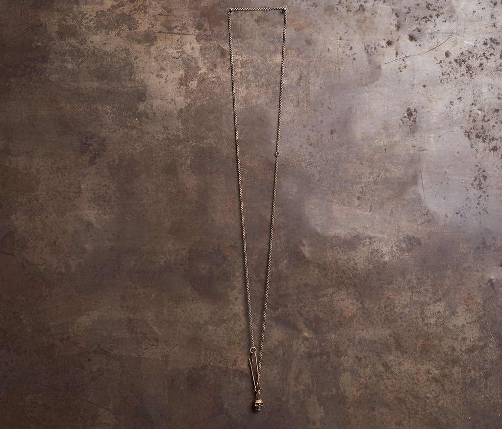 fine chain safety pin+skull gold