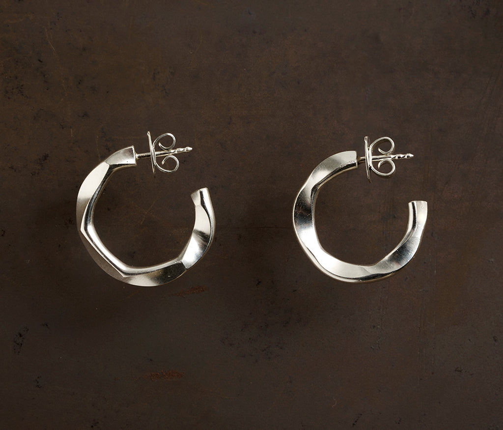 hoop studs facets
