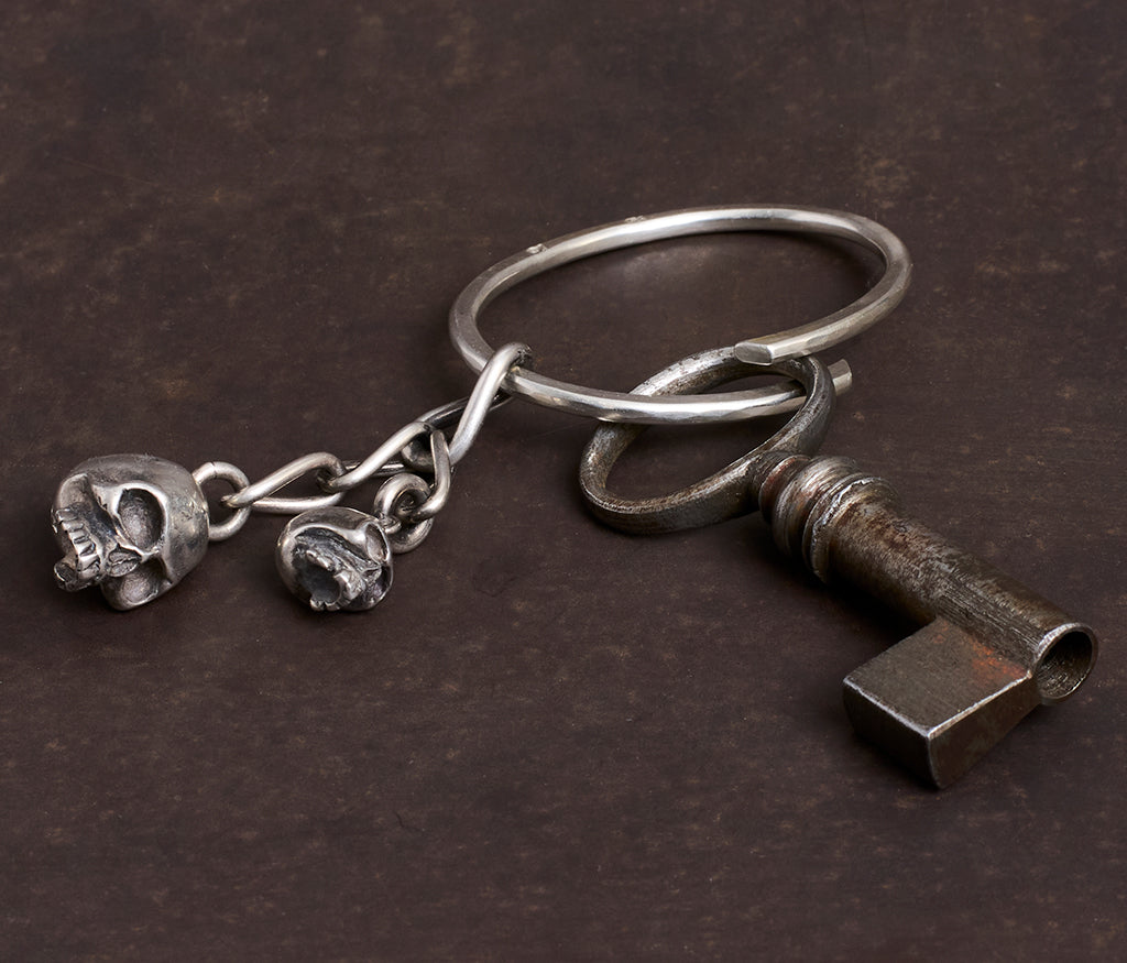 key ring two skulls