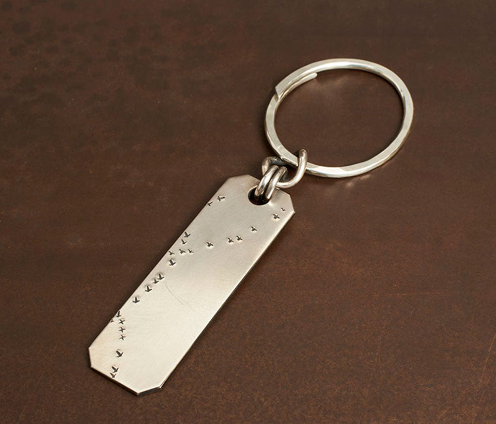 key ring bird flight