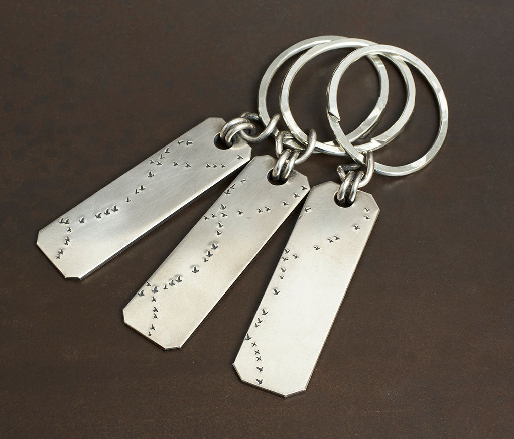 key ring bird flight