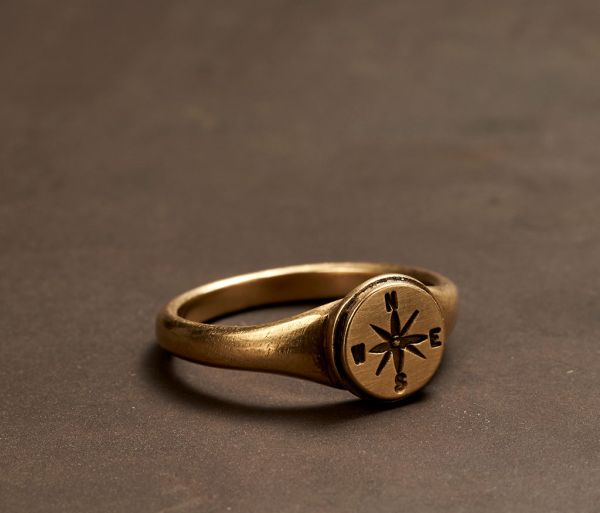 ring symbol windrose gold