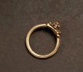ring symbol skull gold