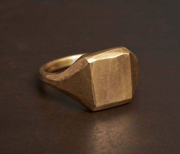 signet ring sculpture gold